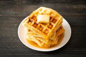 waffle stack with butter and honey photo