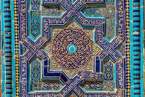 Colorful vintage surface with an old oriental pattern. The background is a texture that has a decorative value. For overlay or texture designs photo