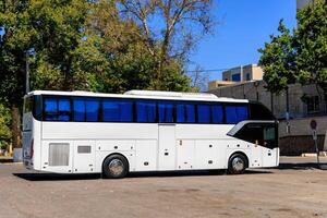 Tourist highway bus for transporting groups of people on travel tours. photo