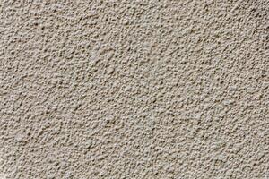Textured plaster and paint background to create a background or textures for the design of a beautiful grunge background. Panoramic abstract decorative background. photo