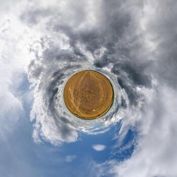 simple little tiny planet without buildings in blue sky with sun and beautiful clouds. Transformation of spherical panorama 360 degrees. Spherical abstract aerial view. Curvature of space. photo