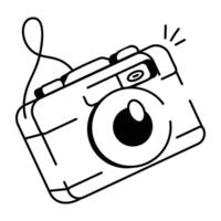 A hand drawn icon of photography camera vector