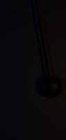 Swing ball moving left and right resembling an old clock pendulum in dynamic 3D motion video