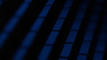 A black and blue background with a blue light video
