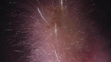 New Year Eve Fireworks Display on Bali Beaches and Silhouette of People Celebrating it in Slow Motion video