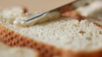 close up of butter spread on a bread video
