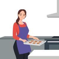 Young woman holding baking tray with homemade cookies wearing apron. vector