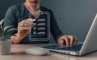 man touch screen to manage data,Document Management System DMS,knowledge and documentation in enterprise with ERP.online documentation database and process automation to efficiently manage files. photo