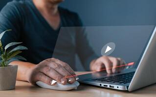 Businessman is using and touching tablet screen in broadcasting, digital technology, social media, and virtual advertising and marketing concept. live streaming digital marketing photo