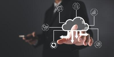 man touch cloud computing diagram show on hand. Data storage.Cloud technology.Secure backup Networking and internet service concept.Implementation storage technology in business. IT support. photo