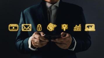 Man use smartphone and touch with icons, Marketers education, research, analyze media streaming content creation and online marketing strategies to grow their digital business. photo
