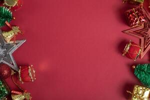 Christmas decorations on a red background photo