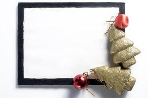 Christmas tree and frame on white background photo