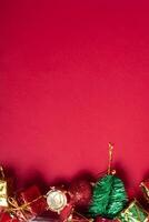 Christmas gifts on red background photo