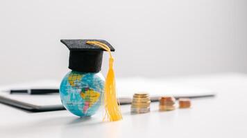 Studying abroad as part of a global education program offers students valuable learning experiences and personal development during their time in college. stock, plan, goal, target, book, degree photo