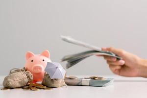 Saving money through wise investments and regular bank deposits can help build wealth and secure financial stability of business. balance, education, interest, price, safety, stack, buy, desk, loan photo