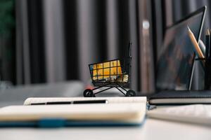 In realm of cyberspace, e-business has revolutionized commerce, allowing people to buy and purchase items through online shopping and digital stores, significantly boosting sales for businesses. spend photo