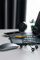 Effective marketing in e-business drives commerce by encouraging online shopping, where customers fill their carts and make purchases during sales, all within vast expanse of cyberspace. idea, pay photo