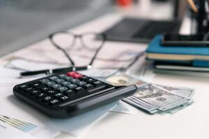 After inspecting finance documents and paperwork, he carefully calculated each tax deduction before filing, hoping for substantial refund on his income. interest, manager, pay, plan, preparation, irs photo