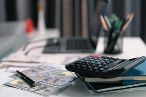 After inspecting finance documents and paperwork, he carefully calculated each tax deduction before filing, hoping for substantial refund on his income. interest, manager, pay, plan, preparation, irs photo