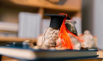 Planning for education abroad involves saving money and making wise investments in finance, which can lead to graduation success, future wealth, cognitive growth, and well-managed budget. hat, idea photo