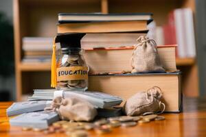 Planning for education abroad involves saving money and making wise investments in finance, which can lead to graduation success, future wealth, cognitive growth, and well-managed budget. hat, idea photo