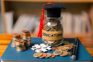 Planning for education abroad requires budgeting money wisely, saving coins, and focusing on future, as it leads to personal growth, cognitive development, and successful graduation as student. photo