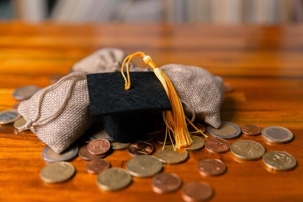 Planning for education abroad involves saving money and making wise investments in finance, which can lead to graduation success, future wealth, cognitive growth, and well-managed budget. hat, idea