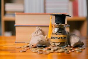 Planning for education abroad requires budgeting money wisely, saving coins, and focusing on future, as it leads to personal growth, cognitive development, and successful graduation as student. photo