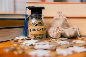 Planning for education abroad involves saving money and making wise investments in finance, which can lead to graduation success, future wealth, cognitive growth, and well-managed budget. hat, idea photo