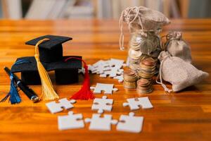 Planning for education abroad involves saving money and making wise investments in finance, which can lead to graduation success, future wealth, cognitive growth, and well-managed budget. hat, idea photo