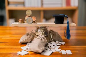 Planning for education abroad involves saving money and making wise investments in finance, which can lead to graduation success, future wealth, cognitive growth, and well-managed budget. hat, idea photo