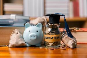 Planning for education abroad requires budgeting money wisely, saving coins, and focusing on future, as it leads to personal growth, cognitive development, and successful graduation as student. photo