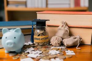 Planning for education abroad involves saving money and making wise investments in finance, which can lead to graduation success, future wealth, cognitive growth, and well-managed budget. hat, idea photo