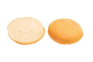 Baked burger buns isolated on white background. top view photo