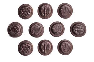 Jaffa cakes, Cookies covered with chocolate and filled with jam isolated on white background photo