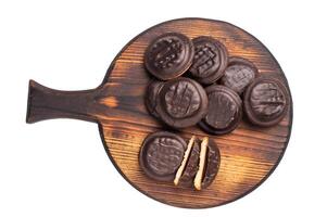 Jaffa Cookies covered with chocolate and filled with jam isolated on white background photo