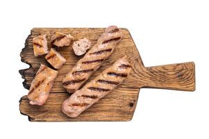 Grilled sliced sausages with beef and pork meat isolated on white background photo