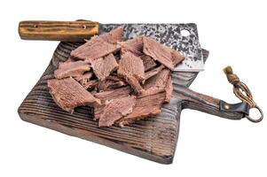 Sliced Boiled beef meat on cutting board isolated on white background photo