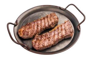 BBQ roast marbled beef Steak, beef meat on tray with herbs isolated on white background photo
