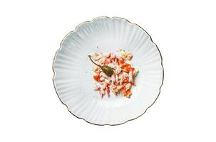 Salad with Crab meat Isolated on white background, top view. photo