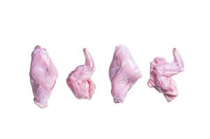 Raw rabbit legs slices on a butcher board. Isolated on white background. photo