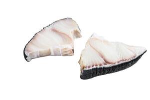 Raw Shark fish steaks on a kitchen table. Isolated on white background. photo