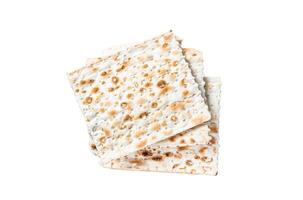 Pieces of matzah in a vintage steel tray. Isolated, white background. photo