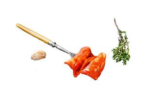 Chorizo sausage thin cut. Spanish salami with spices, paprika, pepper. Spicy food. Isolated on white background. Top view. photo