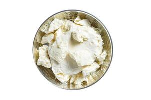 Goat and sheep cheese in a pan with olives and rosemary. Isolated, white background. Top view. photo