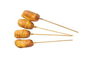 Homemade deep fried corn dogs. Isolated, white background. photo