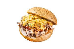 Pulled Pork meat Hamburger with coleslaw salad. Isolated on white background, top view. photo