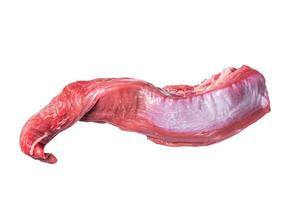 Whole piece of raw beef tenderloin on butcher table. Isolated on white background photo