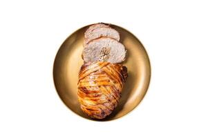 Roasted bacon wrapped meatloaf, sliced mince meat loaf. Isolated on white background. photo